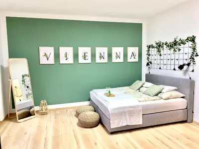 Ein Bett oder Betten in einem Zimmer der Unterkunft Design Apartment Vienna