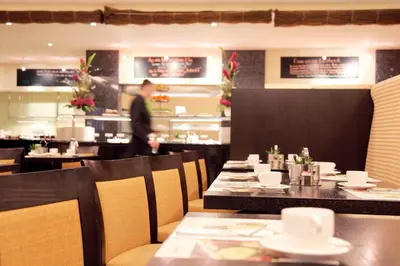 Ein Restaurant oder anderes Speiselokal in der Unterkunft Lindner Hotel Vienna Am Belvedere, part of JdV by Hyatt