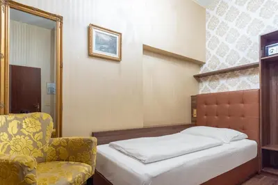 Ein Sitzbereich in der Unterkunft Hotel Urania