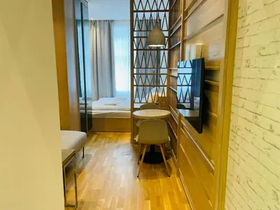 Ein Bett oder Betten in einem Zimmer der Unterkunft ZEUS DESIGN Compact City Aparmtent