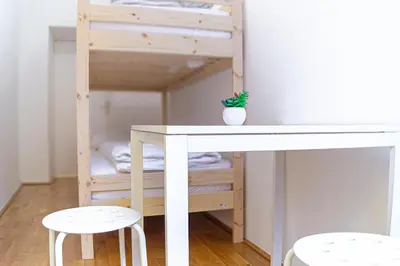 Ein Bett oder Betten in einem Zimmer der Unterkunft Lovely 3 private rooms in shared Apt Near Belvedere