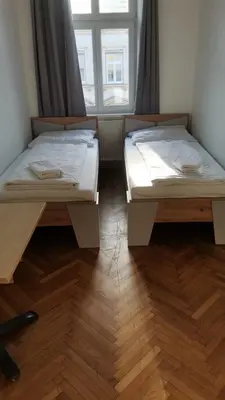 Ein Bett oder Betten in einem Zimmer der Unterkunft Speedyrooms Vienna