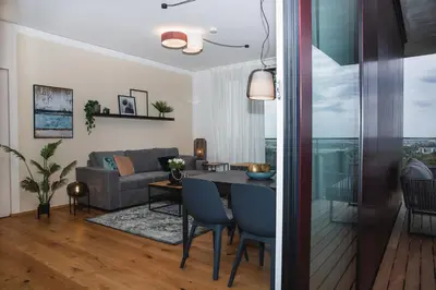 Ein Sitzbereich in der Unterkunft Great apartment with view and heated rooftop Pool