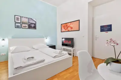Ein Bett oder Betten in einem Zimmer der Unterkunft 522 Mbits Wifi Air Con Free Parking