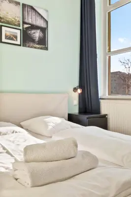 Ein Bett oder Betten in einem Zimmer der Unterkunft 522 Mbit Wifi I Air Conditioning I Free Parking