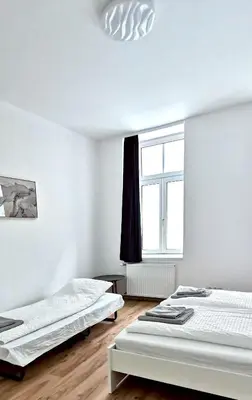 Ein Bett oder Betten in einem Zimmer der Unterkunft Bacher Apartment