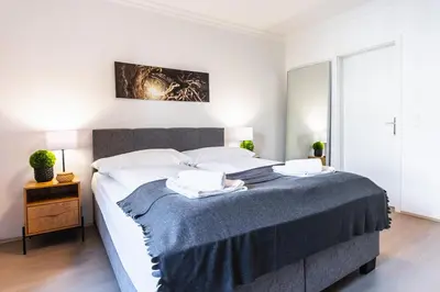 Ein Bett oder Betten in einem Zimmer der Unterkunft Experience Central Vienna from a Stylish and Modern Apartment