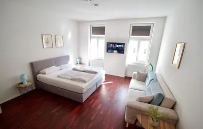 Ein Bett oder Betten in einem Zimmer der Unterkunft Comfortable Apartments Vienna 1100 with contactless Check-in