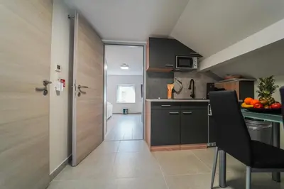 Küche/Küchenzeile in der Unterkunft Ferienhaus in Niederösterreich mit 3 Apartments mitten im Wald