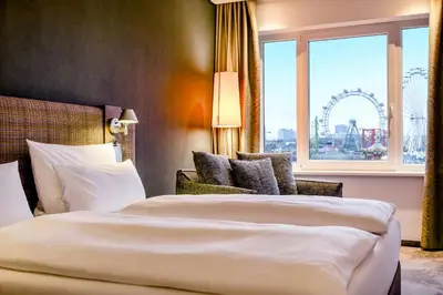 Ein Bett oder Betten in einem Zimmer der Unterkunft Motel One Wien-Prater