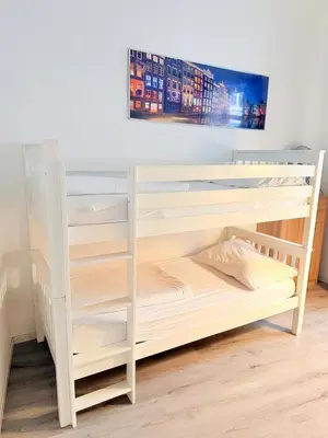 Ein Bett oder Betten in einem Zimmer der Unterkunft Gesamte Unterkunft für 4 Personen Top 3