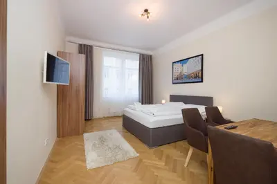 Ein Bett oder Betten in einem Zimmer der Unterkunft Vienna Stay Apartments Schönbrunn