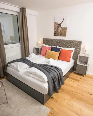 Ein Bett oder Betten in einem Zimmer der Unterkunft Cozy Favoriten