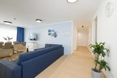 Ein Sitzbereich in der Unterkunft Yourapartment Theresien