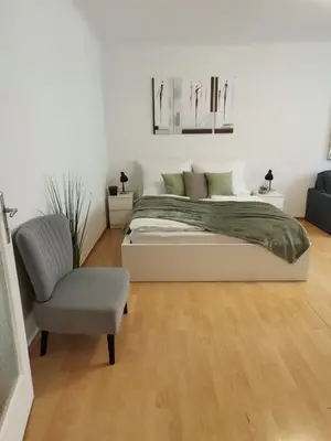 Ein Bett oder Betten in einem Zimmer der Unterkunft Central Alpha Apartment 7min to the city centar