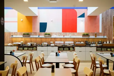 Ein Restaurant oder anderes Speiselokal in der Unterkunft Citadines South Vienna