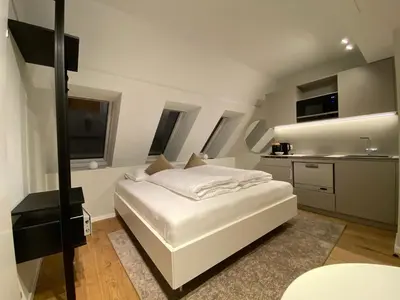 Ein Bett oder Betten in einem Zimmer der Unterkunft Blackhome Wien I contactless check-in