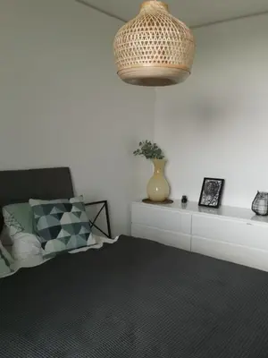 Ein Bett oder Betten in einem Zimmer der Unterkunft My TrIIIple Ferienwohnung zwischen City und Prater