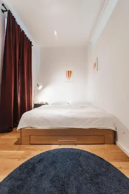 Ein Bett oder Betten in einem Zimmer der Unterkunft Cozy Apartment, 2 Private terraces, 8 min to city center