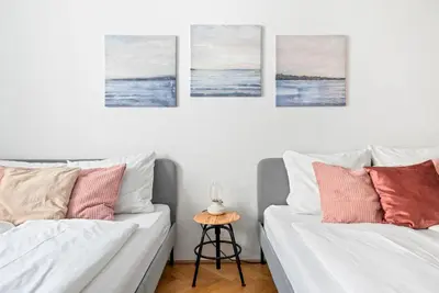 Ein Bett oder Betten in einem Zimmer der Unterkunft 2 BR City Apartment in Neubau, 6 min to city center