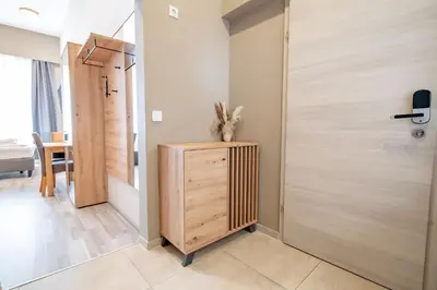 Ein Bett oder Betten in einem Zimmer der Unterkunft Elegance Studios