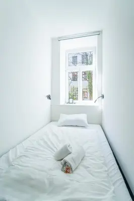 Ein Bett oder Betten in einem Zimmer der Unterkunft josef's home I Studio Mini I near UNO & VIC