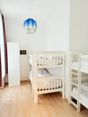 Ein Bett oder Betten in einem Zimmer der Unterkunft Gesamte Unterkunft für 6 Personen