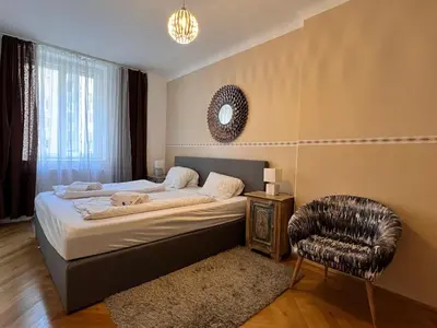 Ein Bett oder Betten in einem Zimmer der Unterkunft Exclusive Apartment Center Vienna