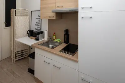 Küche/Küchenzeile in der Unterkunft Radiant Premium Apartments-Muhrengasse