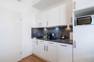 Küche/Küchenzeile in der Unterkunft FeelGood Apartments LakeLiving inklusive Garagenplatz