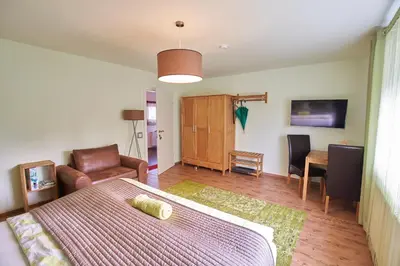 Ein Bett oder Betten in einem Zimmer der Unterkunft Gästezimmer Victoria