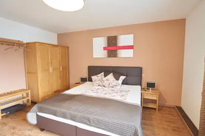 Ein Bett oder Betten in einem Zimmer der Unterkunft Gästezimmer Victoria