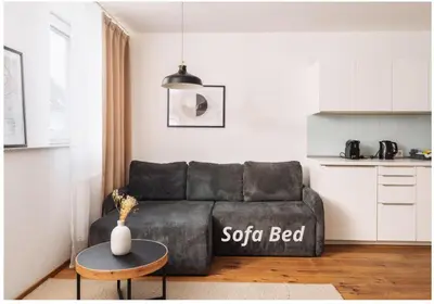 Ein Sitzbereich in der Unterkunft Urban jungle apartment next to Pràter & old town