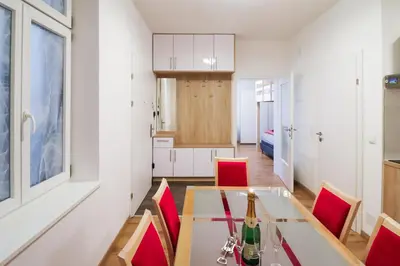 Ein Sitzbereich in der Unterkunft CozyNite Premium Apartment Schönbrunn 1