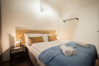 Ein Bett oder Betten in einem Zimmer der Unterkunft Bright boutique apartment located 15 min from Stephansdom