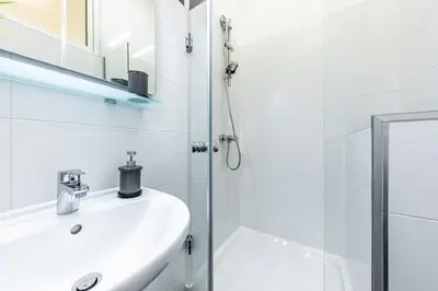 Ein Badezimmer in der Unterkunft MODERN VIENNA by JR City Apartments