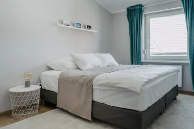 Ein Bett oder Betten in einem Zimmer der Unterkunft Haus Mörbisch