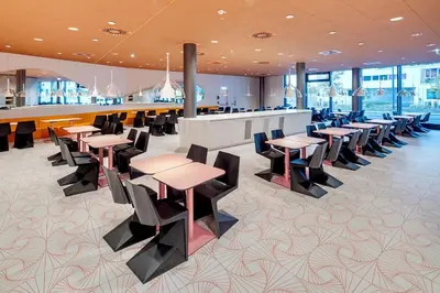 Ein Restaurant oder anderes Speiselokal in der Unterkunft Prize by Radisson, Vienna City