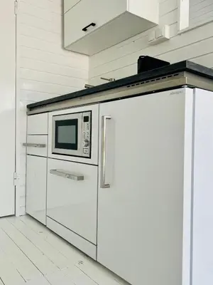 Küche/Küchenzeile in der Unterkunft Seehütte Neusiedlersee - Strandhaus, Elektroboot inklusive