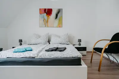 Ein Bett oder Betten in einem Zimmer der Unterkunft Ferienhaus in historischer Hofgasse