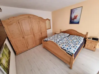 Ein Bett oder Betten in einem Zimmer der Unterkunft Ferienhaus RADO