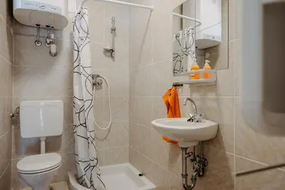 Ein Badezimmer in der Unterkunft Ferienhaus RADO