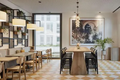 Ein Restaurant oder anderes Speiselokal in der Unterkunft Spark by Hilton Vienna Donaustadt