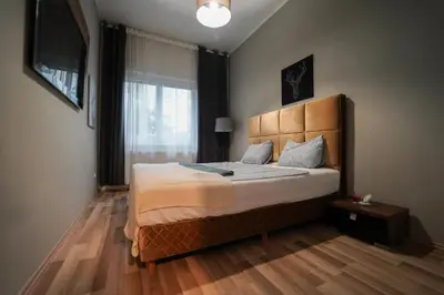 Ein Bett oder Betten in einem Zimmer der Unterkunft Gardenhill Vienna