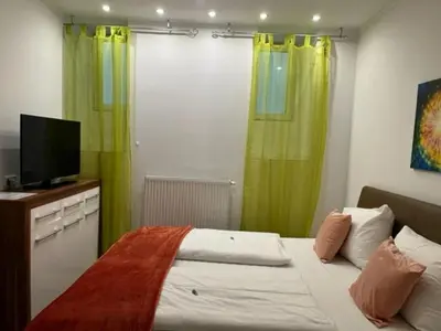 Ein Bett oder Betten in einem Zimmer der Unterkunft Grand Central Station Apartments I contactless check-in