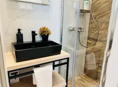 Ein Badezimmer in der Unterkunft ZEUS Design Apartment Erlach #62