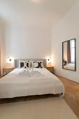 Ein Bett oder Betten in einem Zimmer der Unterkunft josef's home I Deluxe Apartment in Ideal Location