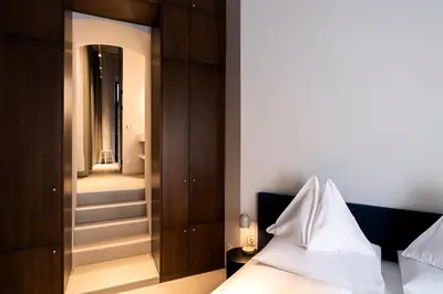 Ein Bett oder Betten in einem Zimmer der Unterkunft grätzlhotel Serviten