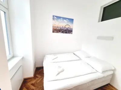 Ein Bett oder Betten in einem Zimmer der Unterkunft Herzlich Willkommen - Küss die Hand 3