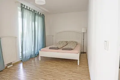 Ein Bett oder Betten in einem Zimmer der Unterkunft Vienna City Apartment 1230 Vienna